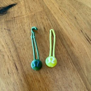 Lululemon zipper pulls/hair ties